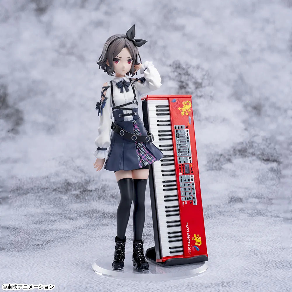 Full front view of the figure and keyboard on clear round and black stands