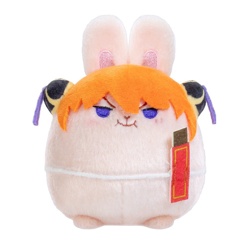 Kagura pale pink egg-shaped plush with rabbit ears, orange hair, black hair-bun covers and a red box patch