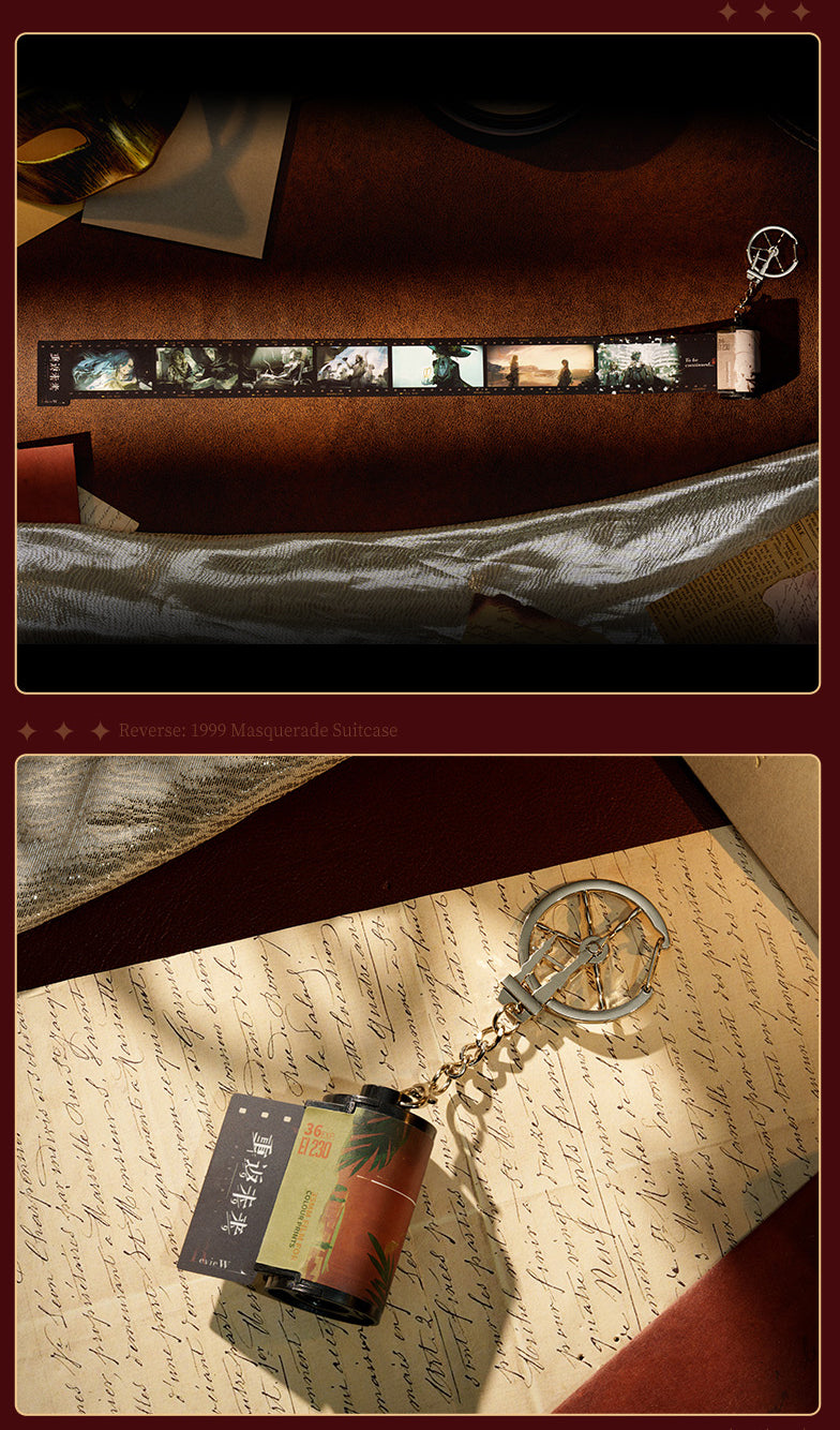 Reverse: 1999: 2nd Anniversary Masquerade Roll Film Keychain - Madness and.