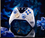 Silver and blue Phainon controller viewed from the front.