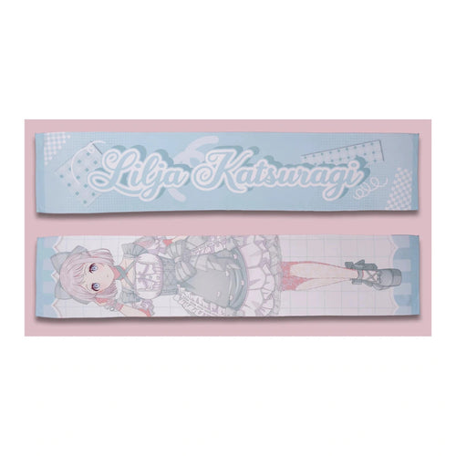 Both sides of the Lilja Katsuragi muffler towel: pale blue name side and full-length lolita-outfit illustration