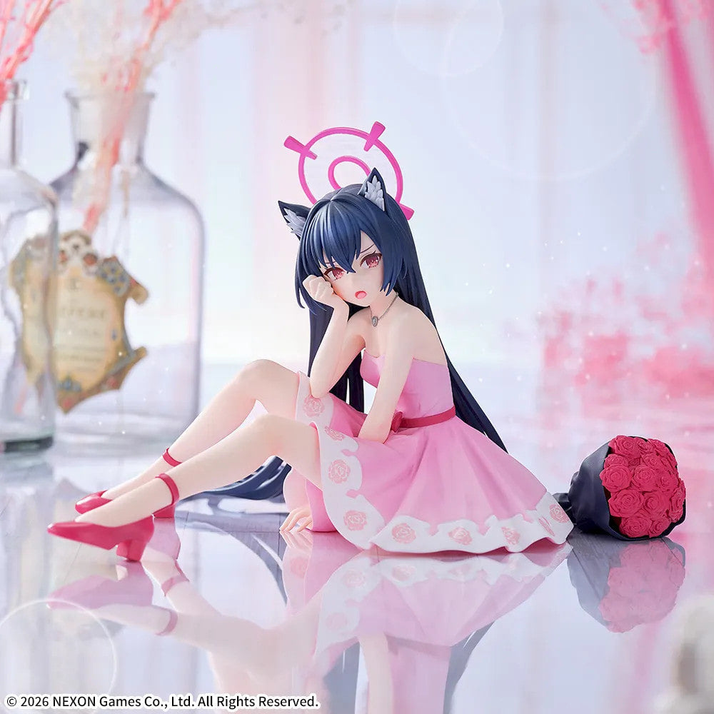 Serika figure sitting in a pink dress beside a red rose bouquet