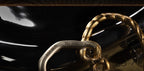 Close-up of the ring engraved 'The Hofmann Knot' with a date and time