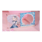 Hiro Shinosawa magnet in two parts: clear illustration plate (left) and light-blue plaid name frame (right)