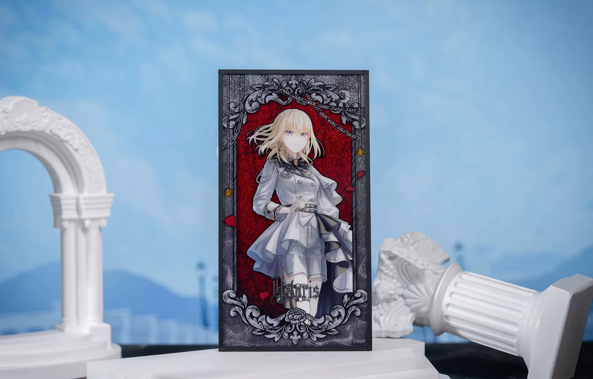The Doloris shikishi standing between a white arch and a fallen column (props not included)