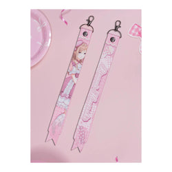 Pink ribbon keychain, front and back: Rinami Himesaki in a pink lolita dress and beret; the back reads Rinami Himesaki