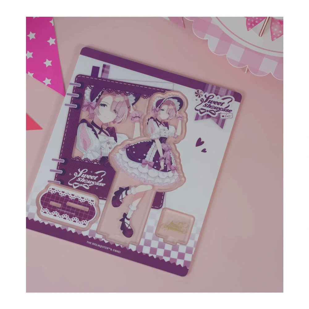 Acrylic stand parts on the printed sheet: Mao Arimura figure in a purple lolita dress, base and signature plate
