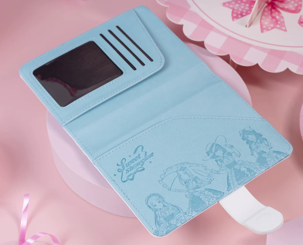 Close-up of the light blue interior with the Sweet Showcase logo and the four Class 1-2 idols