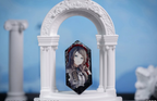 Timoris (Umiri Yahata) badge standing in a white arch display prop