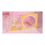 Magnet parts: clear panel with Kotone Fujita winking in a yellow lolita dress; yellow check frame with her name