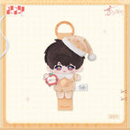 Caleb plush in pajamas and a nightcap, attached to a fabric strap with a matching metal clasp.