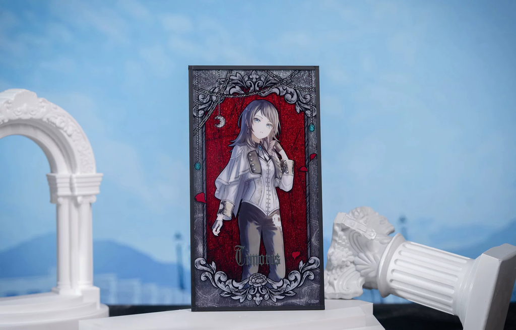 The Timoris shikishi standing between a white arch and a fallen column (props not included)