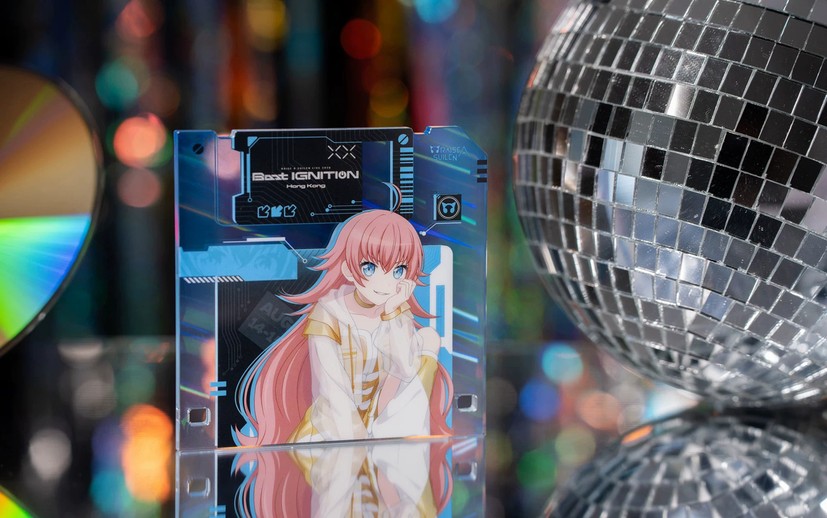 The CHU² coaster standing between a CD and a mirror ball (props not included)