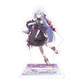 Kanade Yoisaki acrylic stand in a black dress on a purple SEKAI SYMPHONY 2026 base