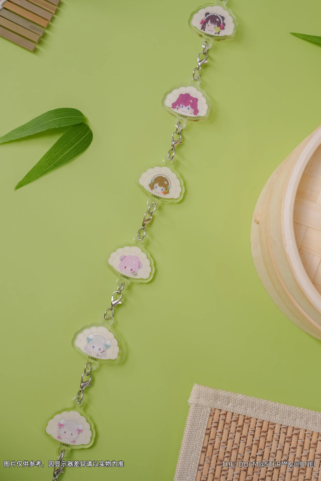 The six character charms linked into one strand with their clasps