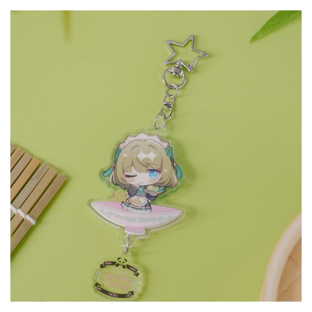 Acrylic keychain: chibi Kaede Takagaki on a bowl-shaped base, winking with a plate of green treats; star clasp and logo charm