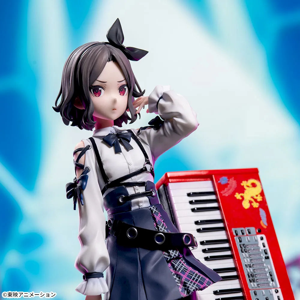 Upper body: white blouse with ribbons, harness straps and a plaid skirt panel, with the keyboard behind