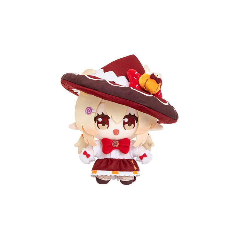 赤い魔女の衣装と、かぼちゃ飾り付きのつば広の魔女帽子のクレーのぬいぐるみ