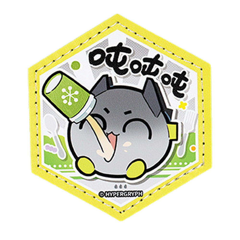 Hexagonal yellow-bordered patch of a round grey creature gulping a drink from a green cup