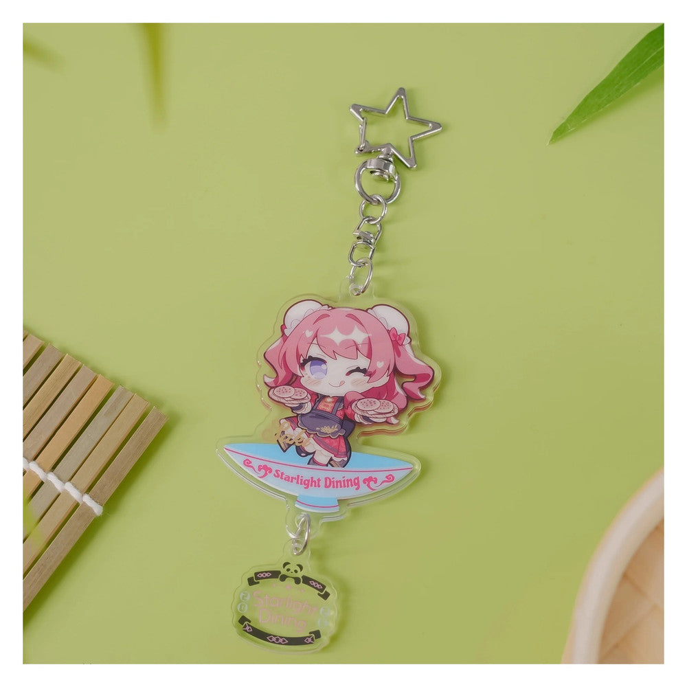 Acrylic keychain: chibi Saki Hanami on a bowl-shaped base, winking with plates of pastries; star clasp and logo charm