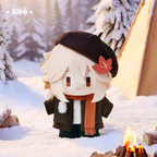 The doll in the snow beside a campfire and a tent (props not included)