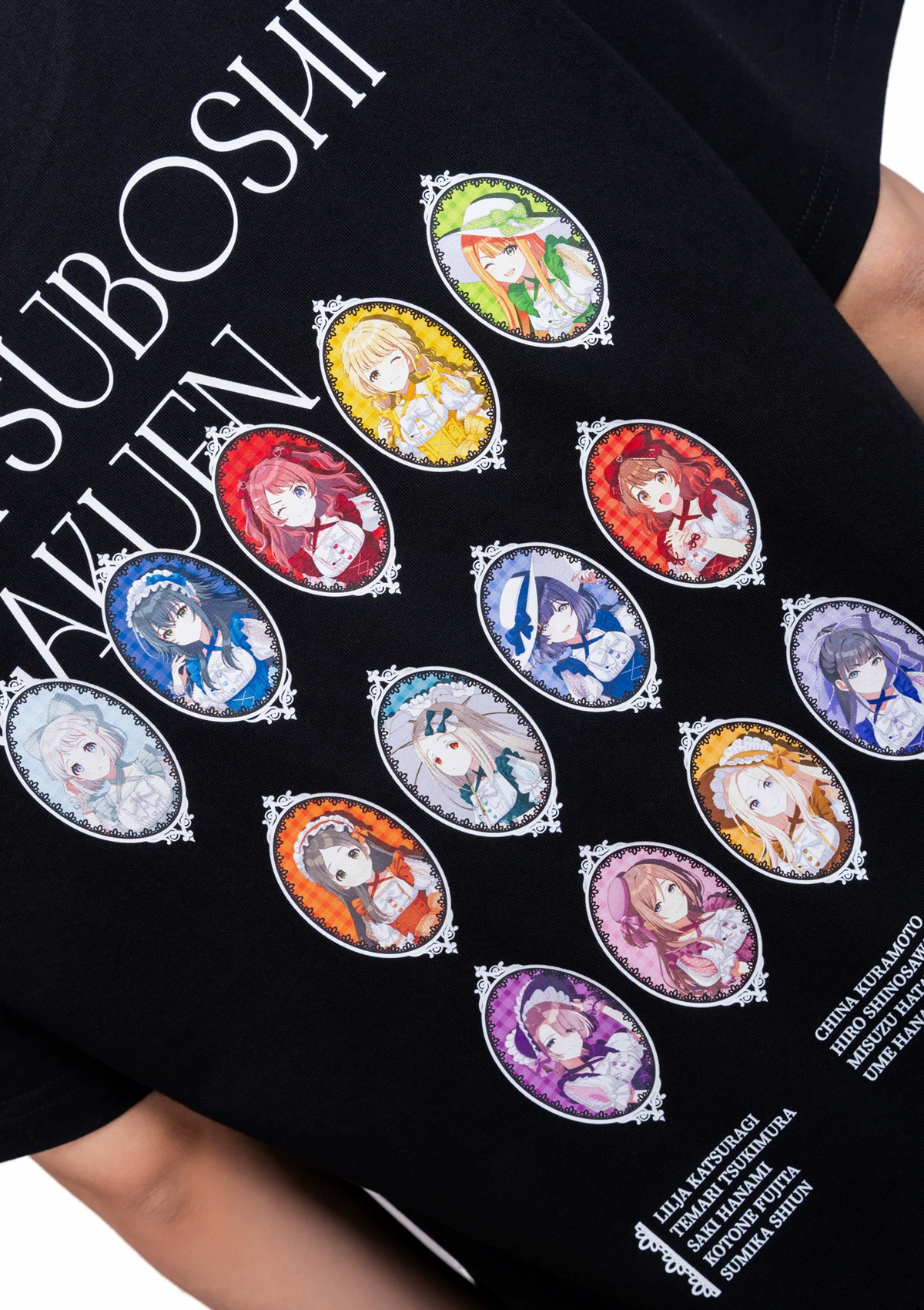 Close-up of the back print with the lolita-outfit portraits and names