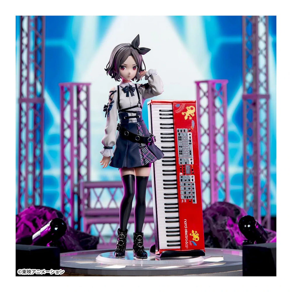 Tomo Ebizuka figure beside a red keyboard on a stage-style display set