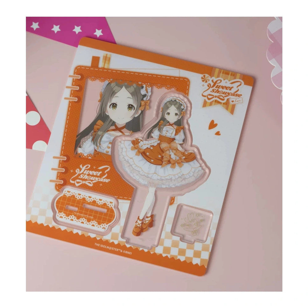 Acrylic stand parts on the printed sheet: China Kuramoto figure in a orange lolita dress, base and signature plate