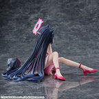 Side-back view showing her long hair spread on the floor and her red heels