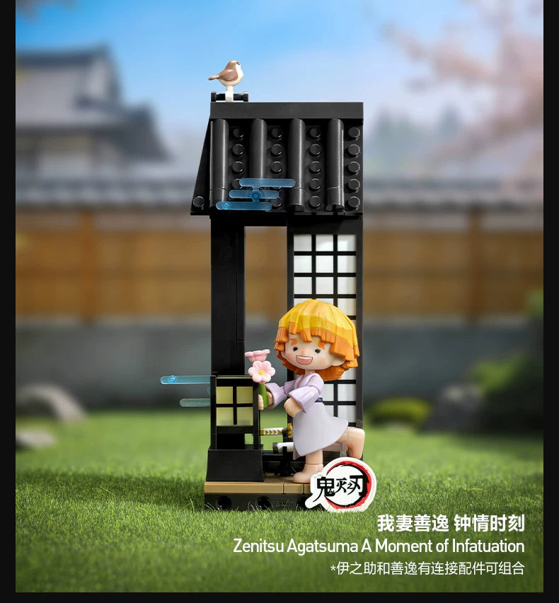 公式の情景写真：花を持った我妻善逸と建物、屋根の上の小鳥を備えたブロックフィギュア。