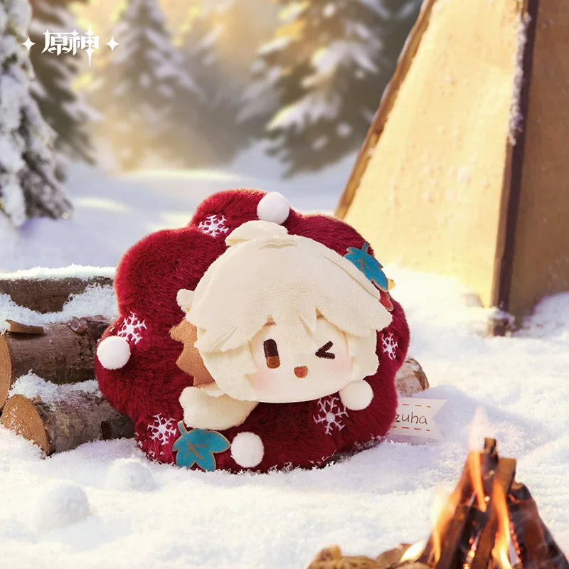 The keychain in the snow beside logs and a campfire (props not included)