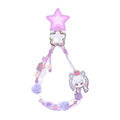 Yachiyo Runami phone strap in lavender with a star charm, flower-shaped ring, beads, pom-poms and a small Yachiyo charm