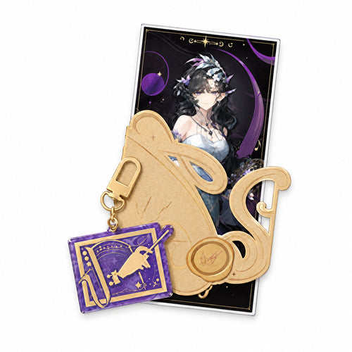 Isolde ticket with a gold decorative cover and wax-seal motif, plus a purple acrylic keychain