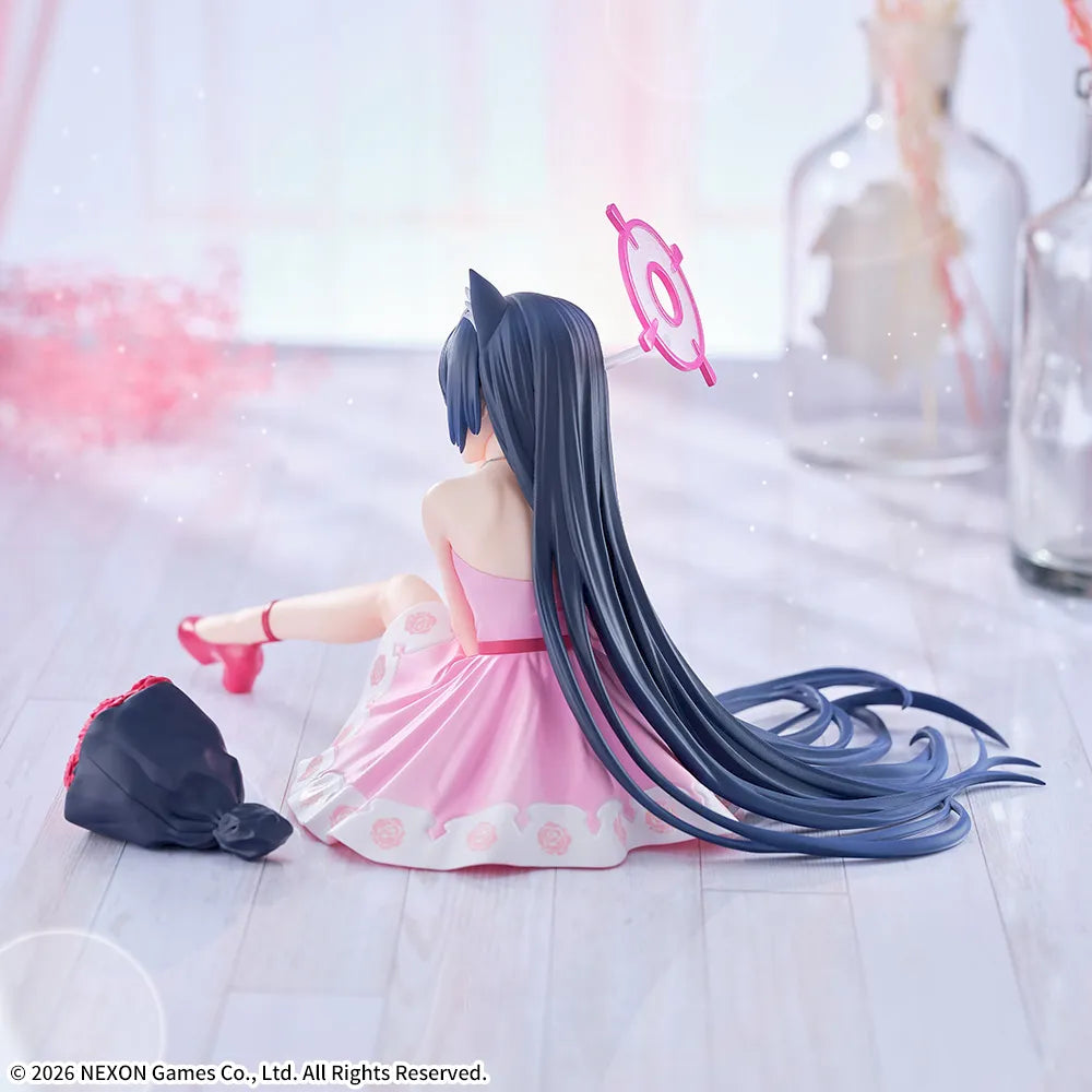 Back view showing her long dark hair, the halo and the bouquet