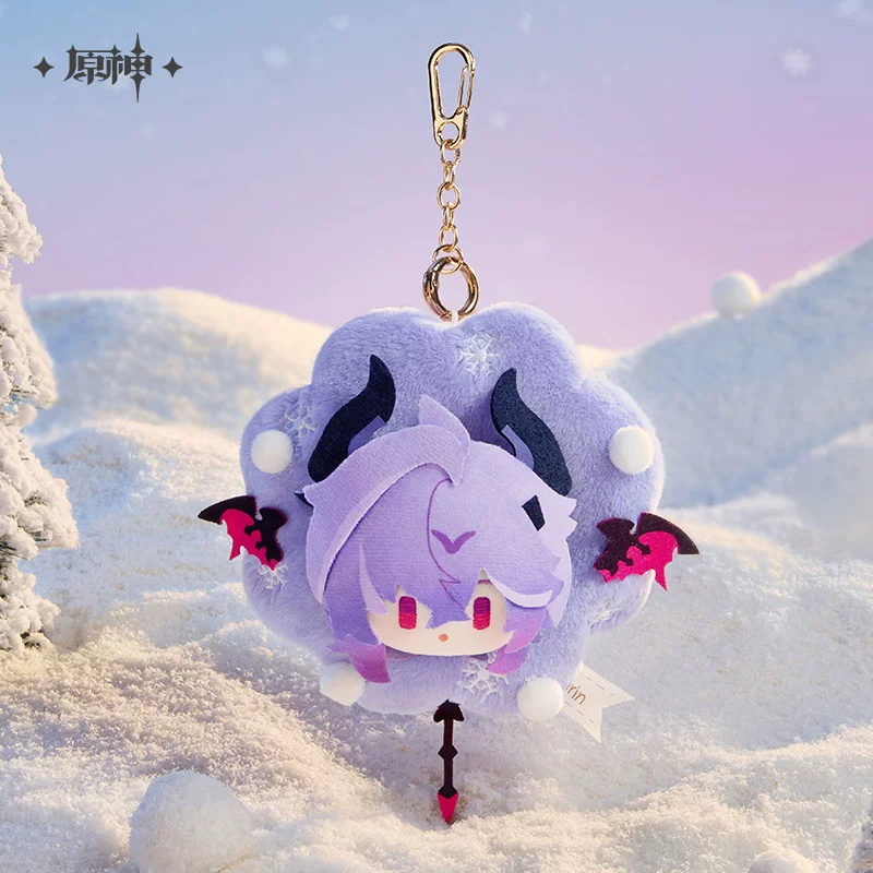 The keychain against snowy hills at dusk